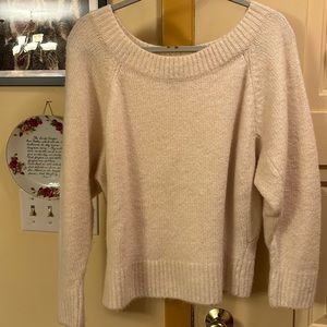 Beautiful sweater top for a night out winter white.
